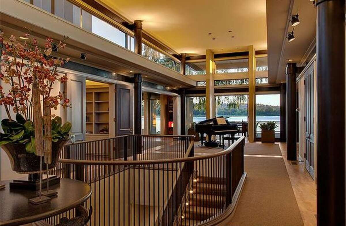 The entry way has high ceilings and a view of Lake Washington through the back. (Windermere.com) See the listing.