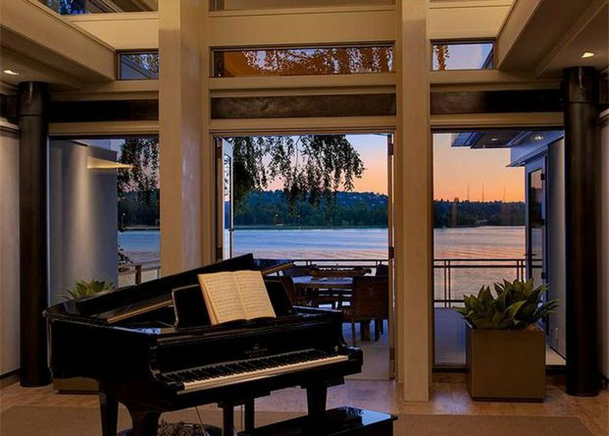 The deck can be seen through the floor-to-ceiling windows. (Windermere.com) See the listing.