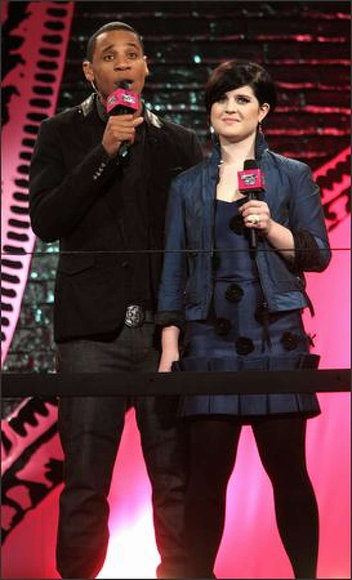 Hosts Reggie Yates and Kelly Osbourne present artists on stage at the BRITs Nominations Launch Party at the Roundhouse, Camden in London, England.