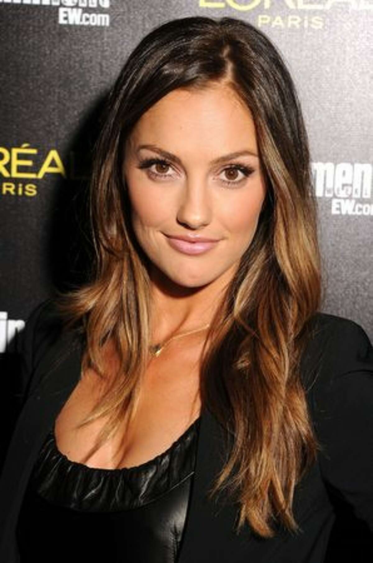 Actress Minka Kelly arrives at Entertainment Weeklyâ€™s celebration honoring the 17th Annual Screen Actors Guild Awards nominees hosted by Jess Cagle and presented by Lâ€™Oreal Paris at Chateau Marmont in Los Angeles, California.