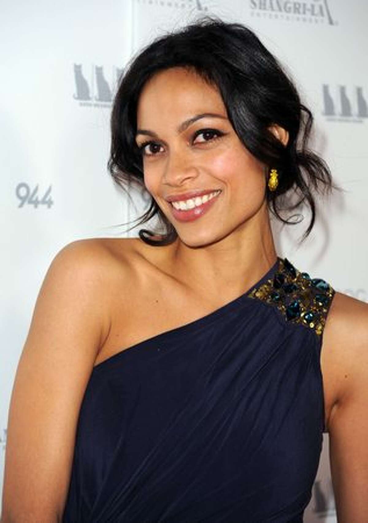 Actress Rosario Dawson arrives at the premiere Of Shangri-La Entertainment's "Girl Walks Into A Bar" held at the ArcLight Cinemas in Los Angeles, California.