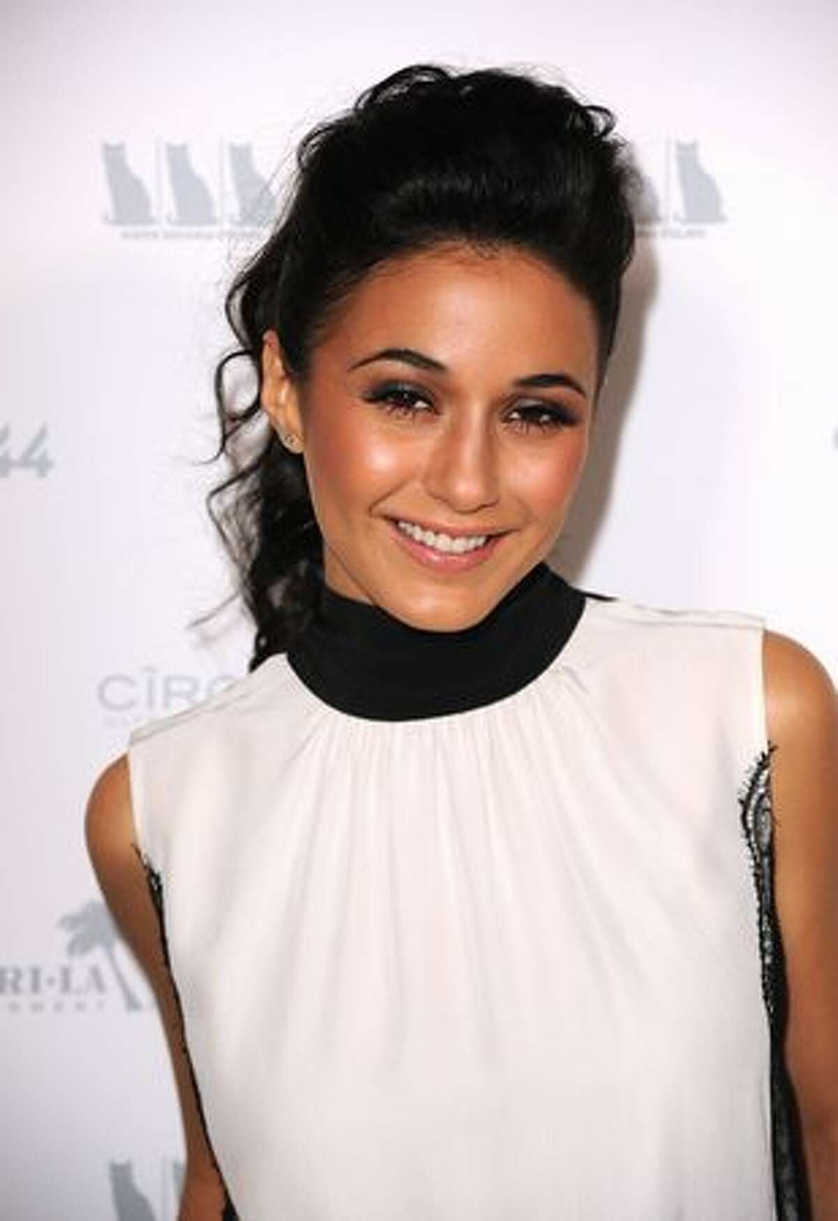 Actress Emmanuelle Chriqui arrives premiere Of Shangri-La Entertainment's "Girl Walks Into A Bar" held at the ArcLight Cinemas in Los Angeles, California.