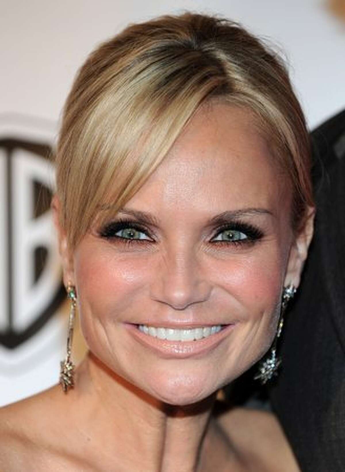Actress/singer Kristin Chenoweth poses on the red carpet at the Geffen Playhouse's Annual Backstage at the Geffen Gala in Los Angeles, California.