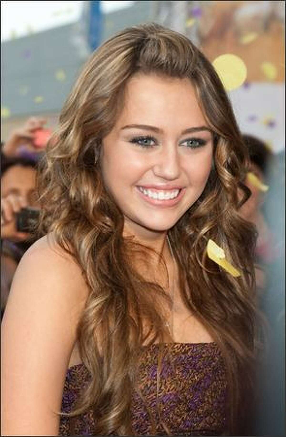 Actress Miley Cyrus attends 'Hannah Montana: The Movie' premiere in Rome, Italy.