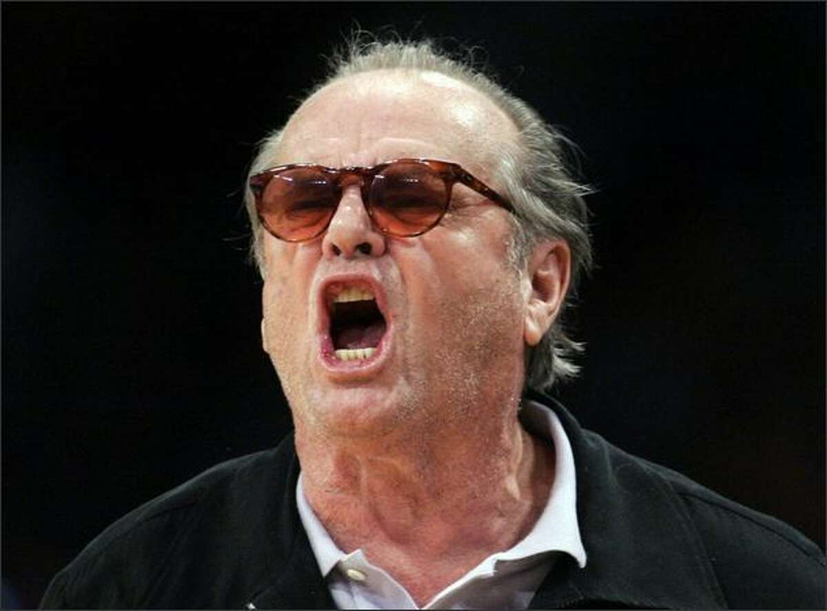Actor Jack Nicholson yells at the referee during the second half of Game 2 of their NBA Western Conference semi-final basketball playoff game between the Houston Rockets and the Los Angeles Lakers in Los Angeles. (REUTERS/Danny Moloshok)
