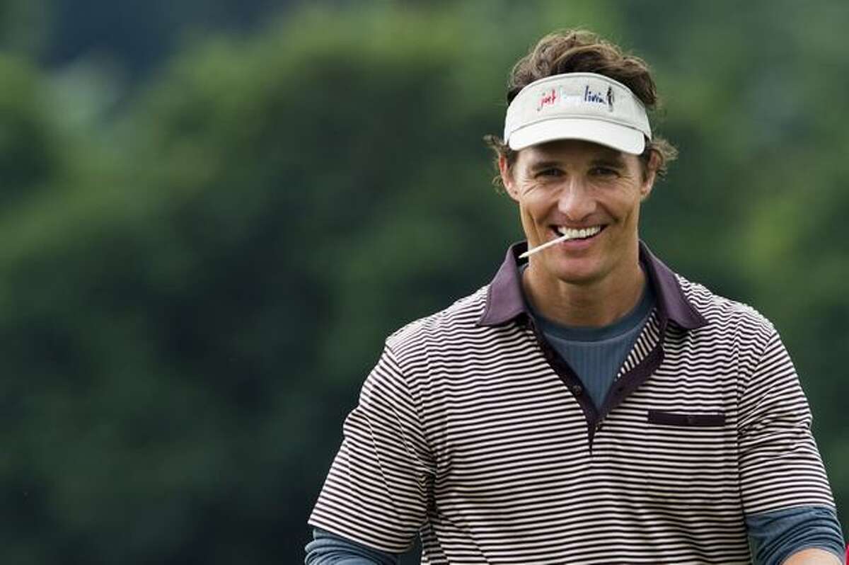 Actor Matthew McConaughey reacts on the 2nd green during day three of the Mission Hills Start Trophy tournament at Mission Hills Resort in Haikou, China.