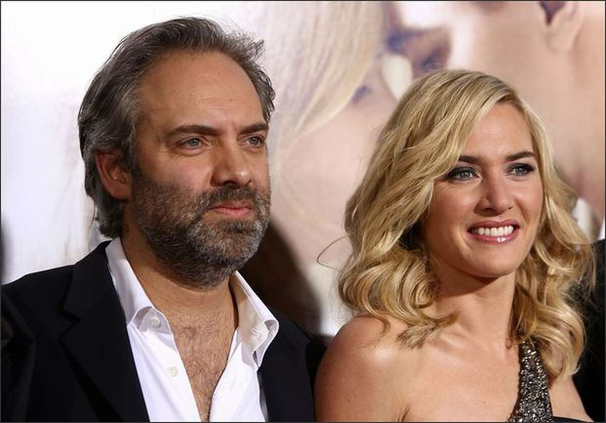 Director Sam Mendes and actress Kate Winslet arrive at Paramount Vantage's Los Angeles premiere of 'Revolutionary Road' held at Mann Village Theater in Westwood, California.