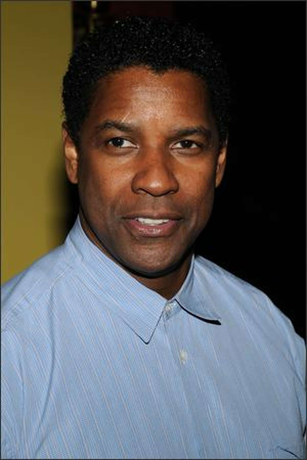 Actor Denzel Washington arrives at the premiere of "The Great Debaters" at the Ziegfeld theater on Wednesday in New York City.