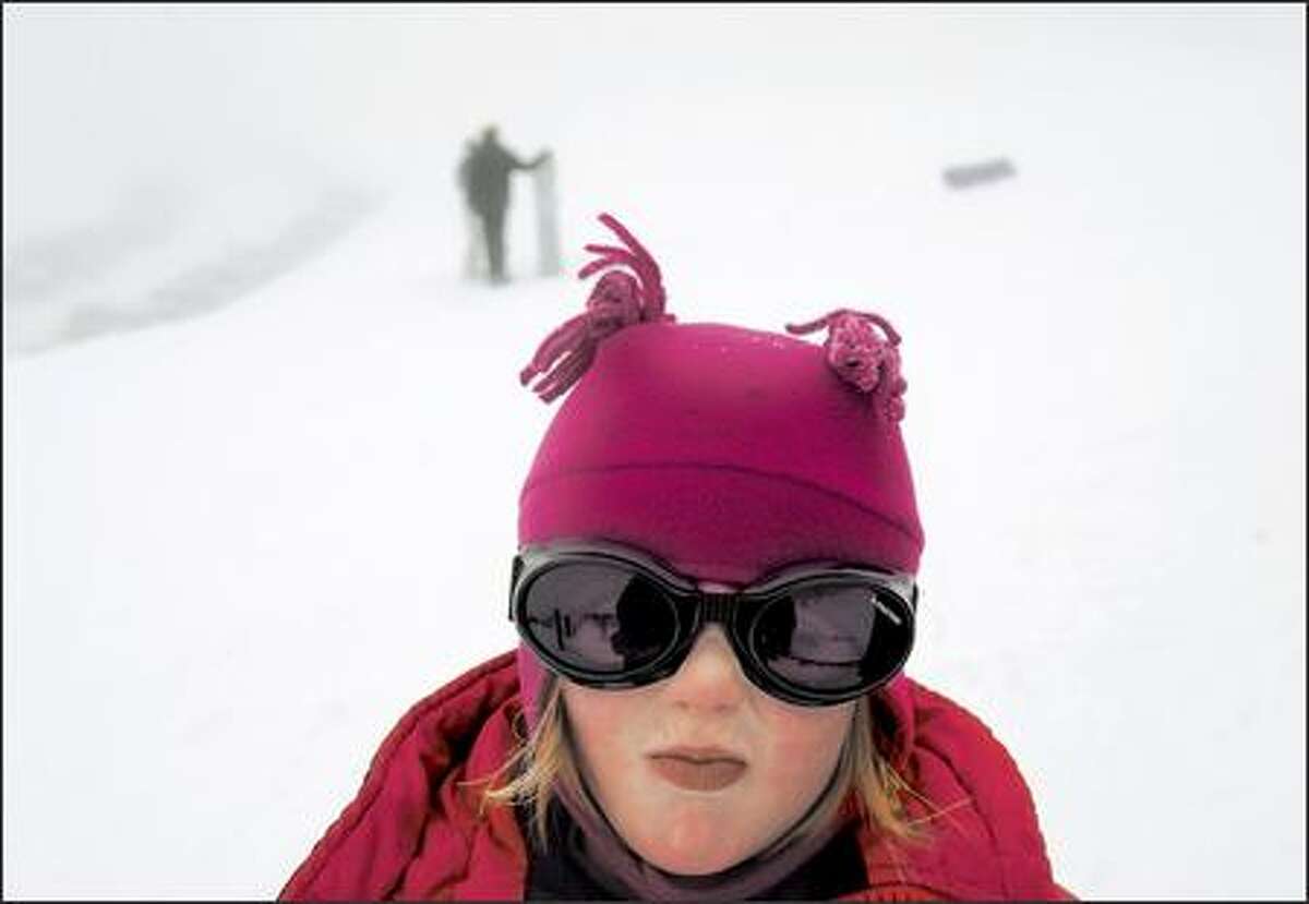 Mira Hitchcock, 5, is bundled against the cold during a ski lesson at Hurricane Ridge in Olympic National Park.
