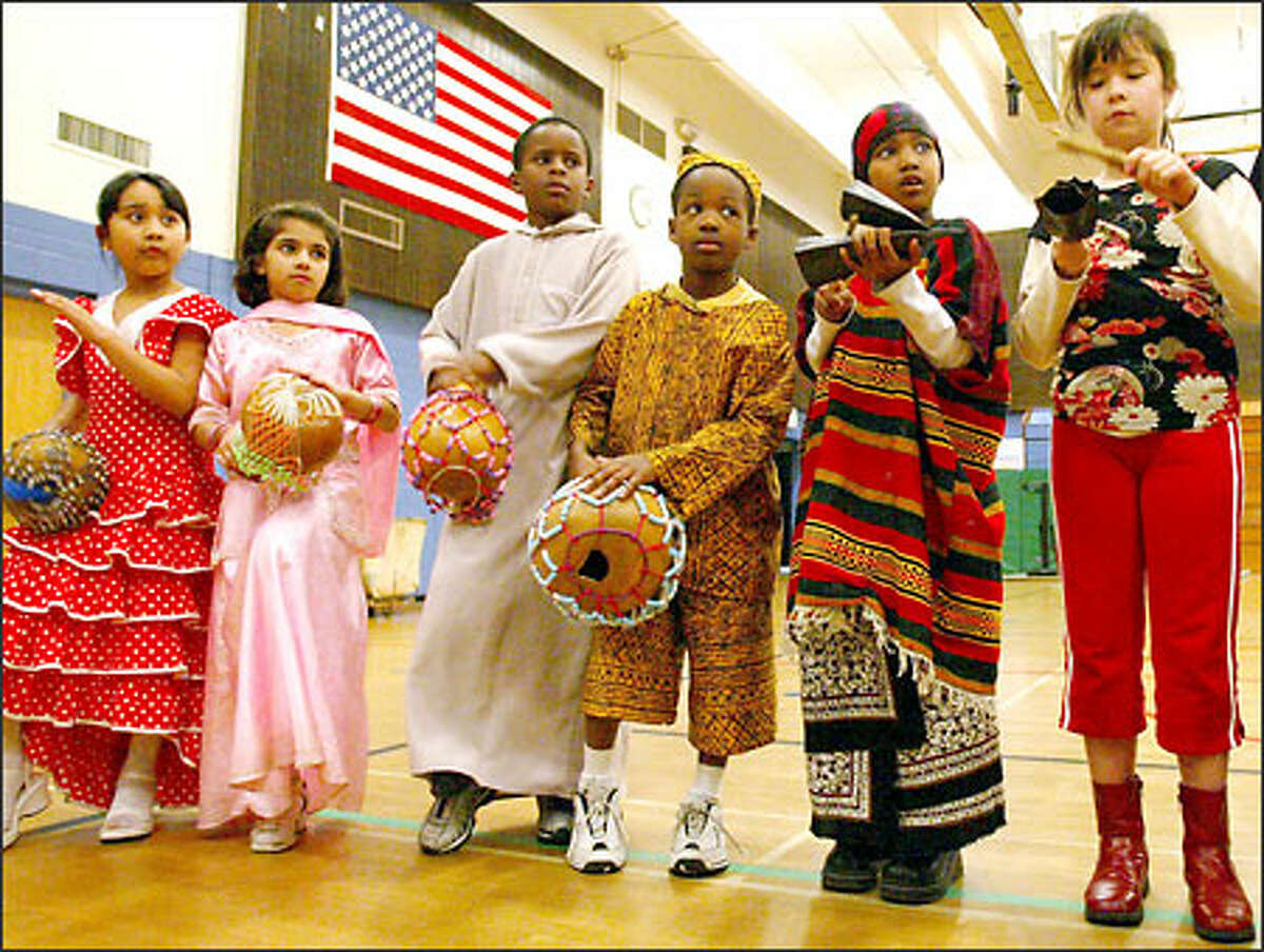 Seattle's Broadview-Thomson Elementary School sponsored a performance by Adefua African Music and Dance Company Wednesday. At the conclusion of the assembly, students, dressed in traditional clothing of their native countries, played African instruments with Adefua’s drummers and dancers.
