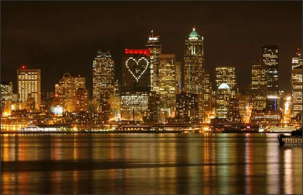 Washington Mutual proved the night of Feb. 13 that Seattle has heart with a big valentine to the city on the west side of the WaMu Center downtown. The company created the 180-foot illuminated heart by having employees close window blinds in three parts of the building and open select ones in the form of a heart.