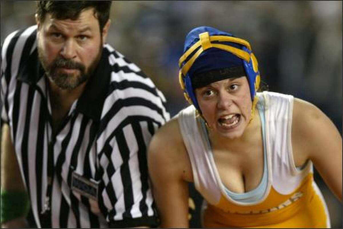 Kirsten Schumacher of Fife High School shows her frustration during her match against Jessica Johnstone of Chewelah High School during girls preliminary wrestling competition at the Tacoma Dome.