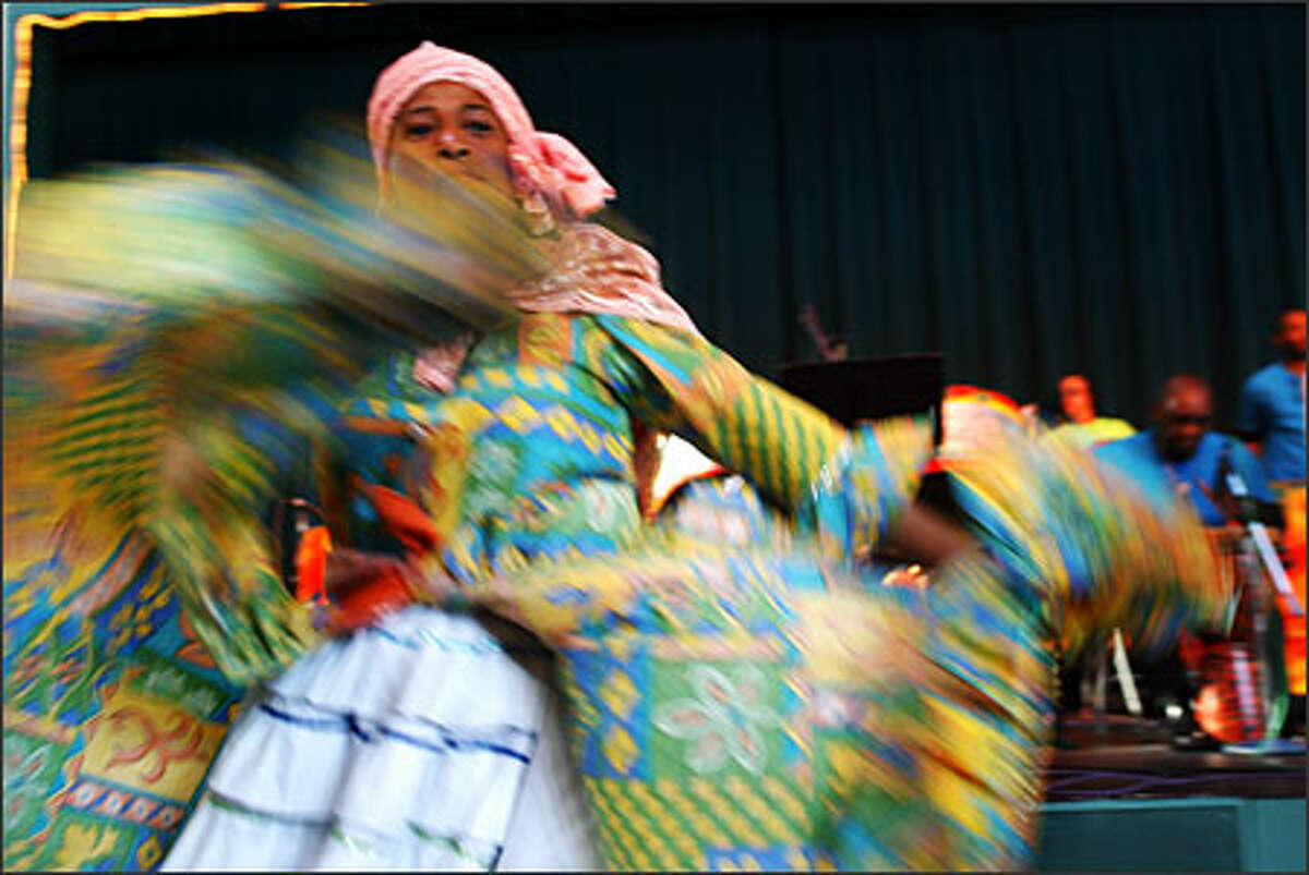 At the Seattle Center on Sunday, Gaye Guada dances to the music of the Island Jamz Inc. Steeldrum Band at Festival Sundiata, which celebrated Black History Month this past weekend. One of the largest black history celebrations takes place in Tacoma Monday and Tuesday.