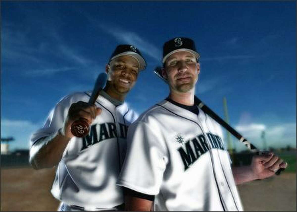 Seattle Mariners middle-of-the-lineup guys Adrian Beltre, left, and Richie Sexson pose at teh team's spring training complex in Peoria, Ariz.
