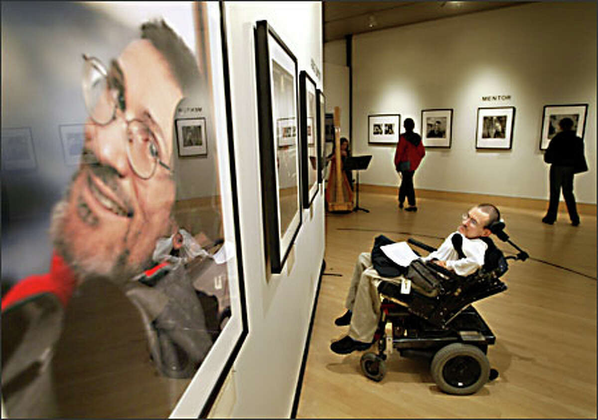 Mike Smith of Seattle attends the opening of the photo exhibit "Washington State Heart Gallery" Tuesday. His portrait, taken by Seattle photographer Steve Davis, was among those at the show’s unveiling in the City Space Gallery, on Level 3 of the Bank of America Tower, 701 Fifth Ave. The exhibit will run through May 6.