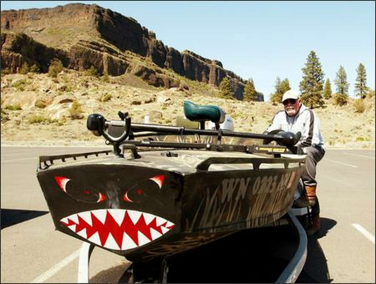 Fisherman Ben Welton parks his bass/duck boat in the boat launch parking area at Steamboat Rock State Park.