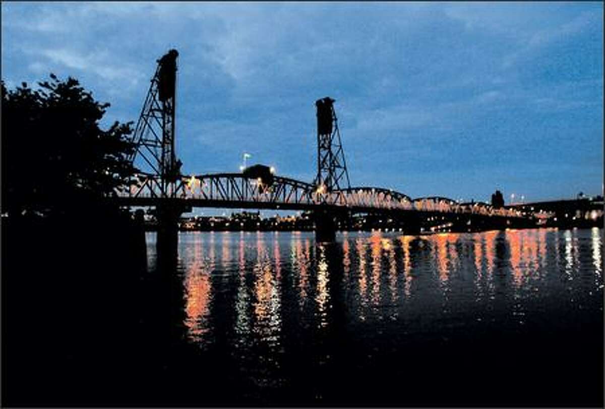 Spanning the Willamette River, the Hawthorne Bridge forms one end of the Waterfront Loop and is popular with crosstown bikers. It is just one of 11 bridges across the Willamette in Portland.