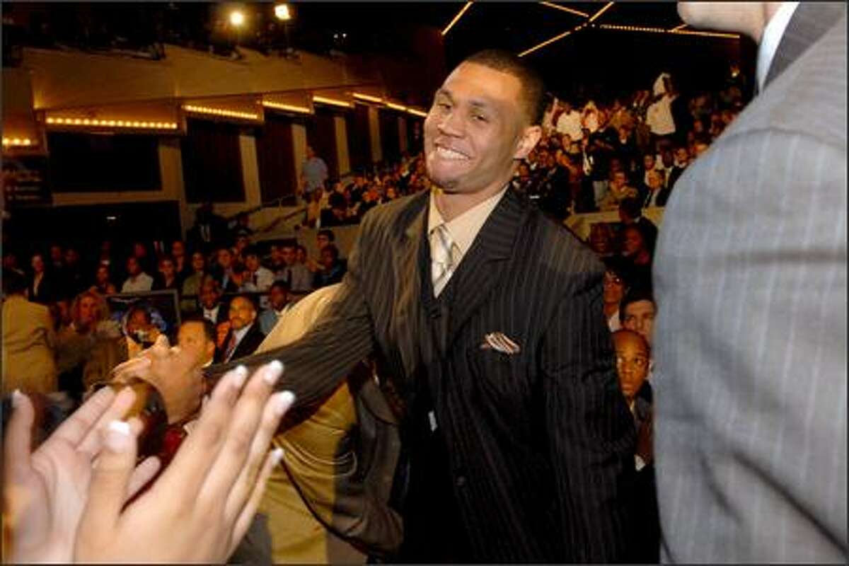 Brandon Roy is congratulated upon being picked sixth overall by Minnesota.