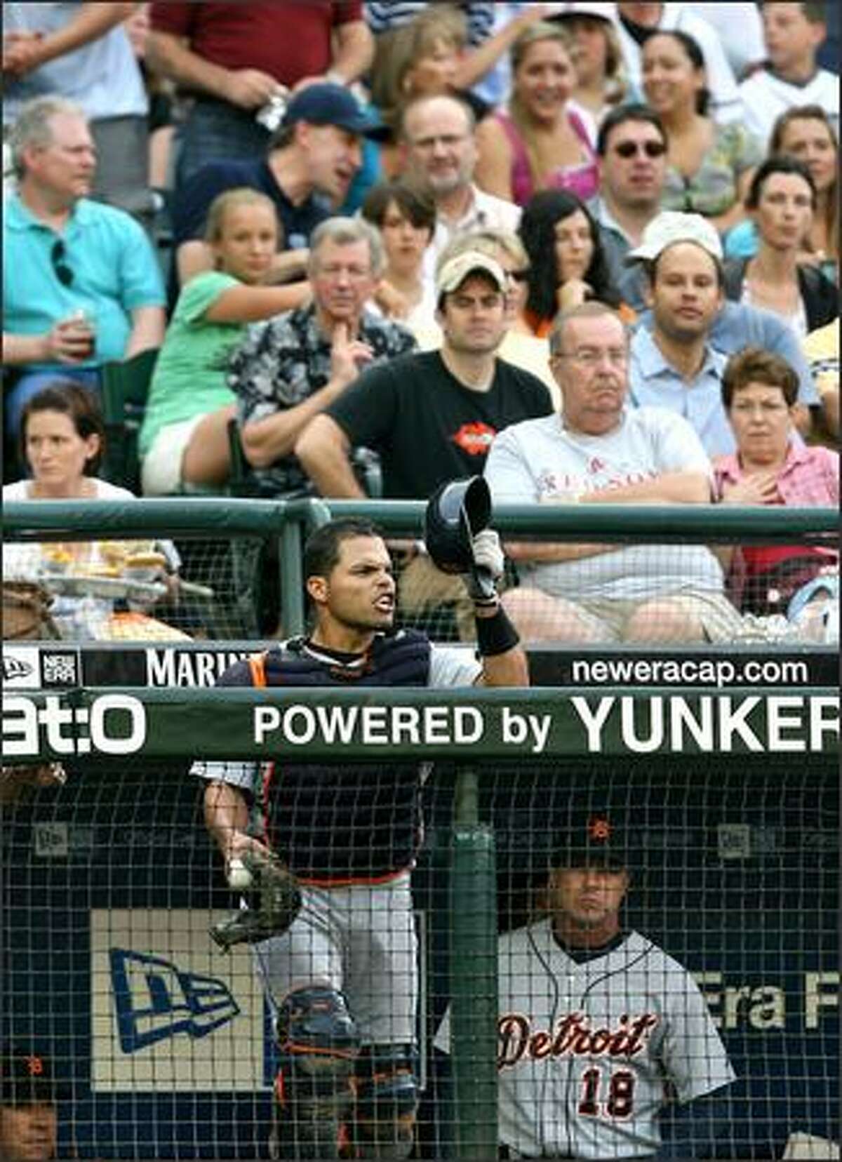 Ivan Rodriguez continues to yell obscenities from the dugout after being ejected from the game by plate umpire Mike Winters in the fourth inning.