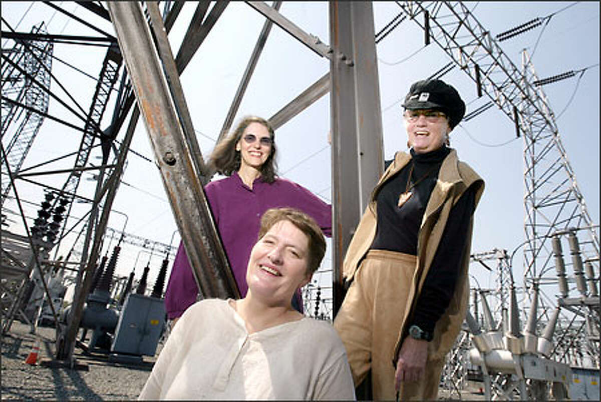 Megan Cornish, left, Heidi Durham, center, and Teri Bach jumped at the chance to train in Seattle City Light's Electrical Trades Program when it was opened to women in 1973. Their efforts over the past 30 years brought changes to the pretraining and apprenticeship programs, city officials say.