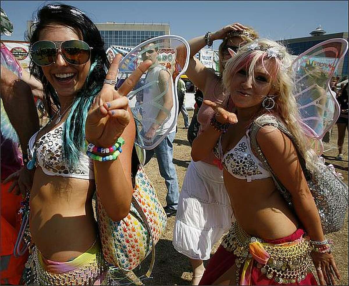 Girls dressed as fairies blow kisses at the Seattle Hempfest XVII at Myrtle Edwards Park.
