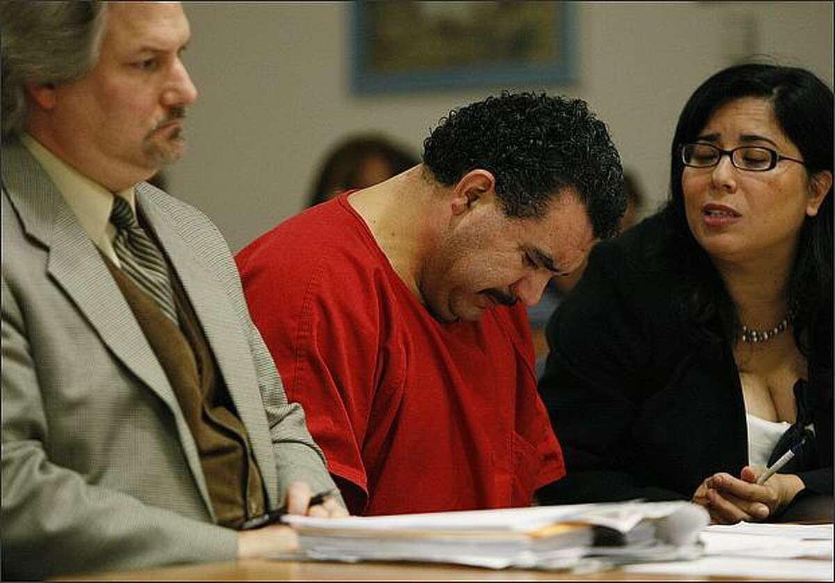 Alberto Rios, center, shows his emotion during his sentencing hearing at the King County Regional Justice Center on Friday, October 3, 2008, in Kent. Rios was convicted of manslaughter in the second degree and sentenced to 23 months in prison. (Brad Vest/Seattle Post-Intelligencer)