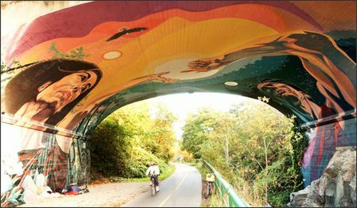 One of the largest murals in Victoria covers the 3,000-square-foot underside of this concrete bridge along the Galloping Goose Regional Trail north of the Selkirk Trestle.