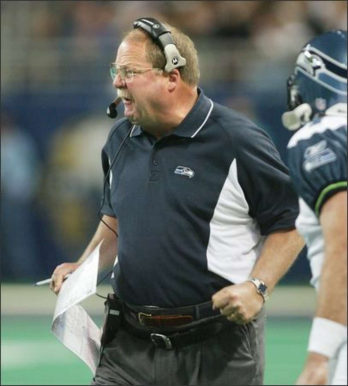 Mike Holmgren was furious with the officials as they overturned their original call of a reception by Darrell Jackson in the third quarter.