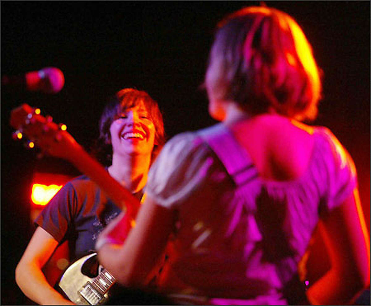 Olympia-based Sleater-Kinney guitarists Carrie Brownstein and Corin Tucker perform at The Showbox.