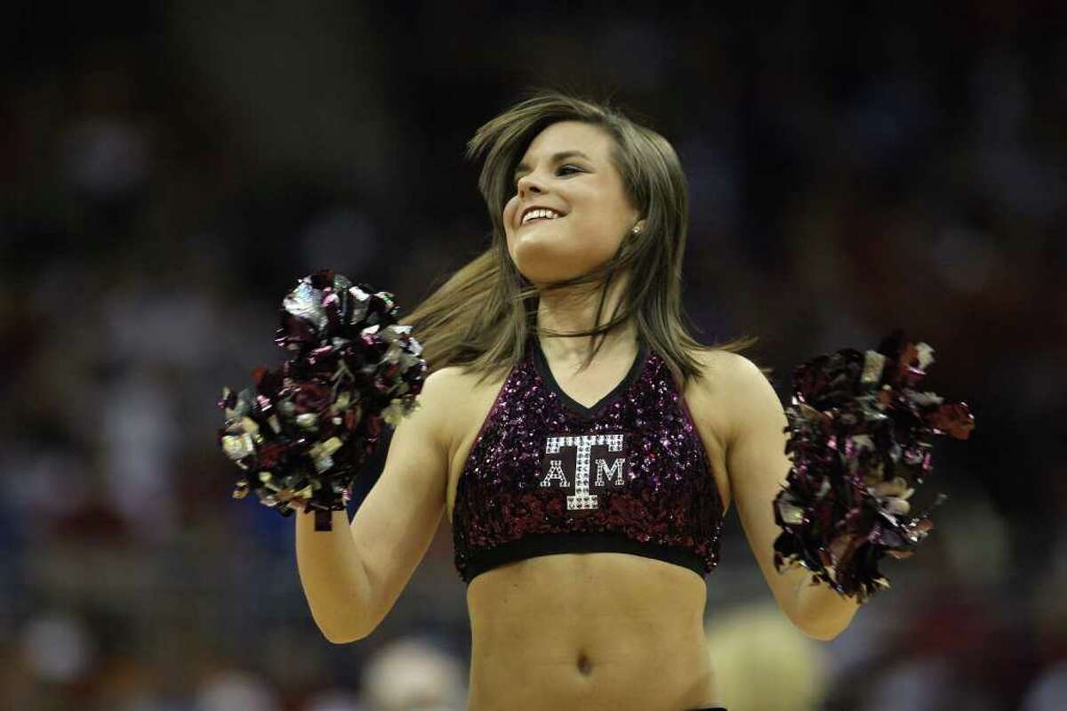 KANSAS CITY, MO - MARCH 13: A Texas A&M Aggies cheerleader performs during the game against the Iowa State Cyclones during day 1 of the Big 12 Men's Basketball Tournament on March 13, 2008 at the Sprint Center in Kansas City, Missouri.