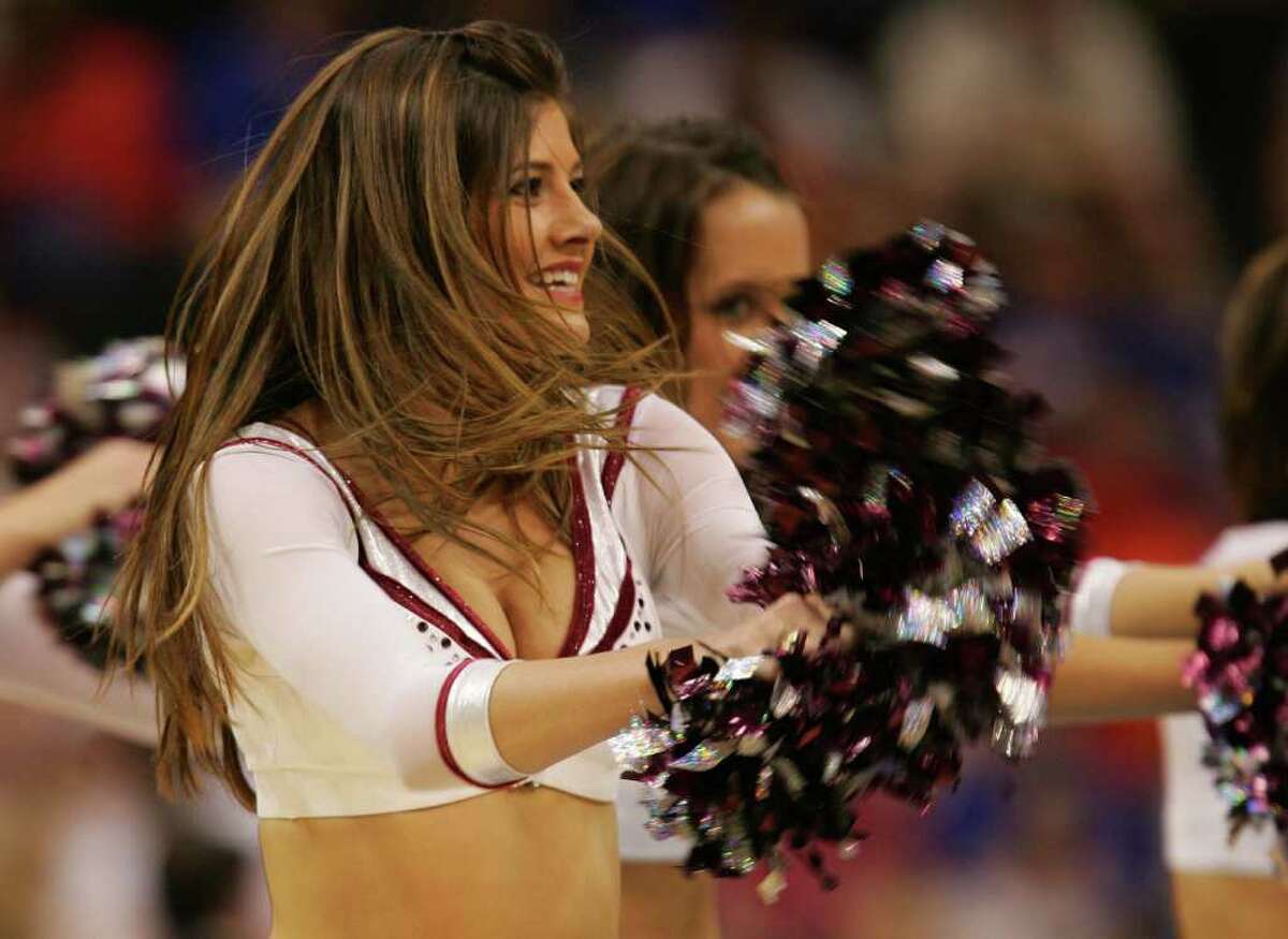 JACKSONVILLE, FL - MARCH 18: Cheerleaders for the Texas A&M Aggies perform during their game against the LSU Tigers in round two of the NCAA National Championship on March 18, 2006 at the Veterans Memorial Arena in Jacksonville, Florida.