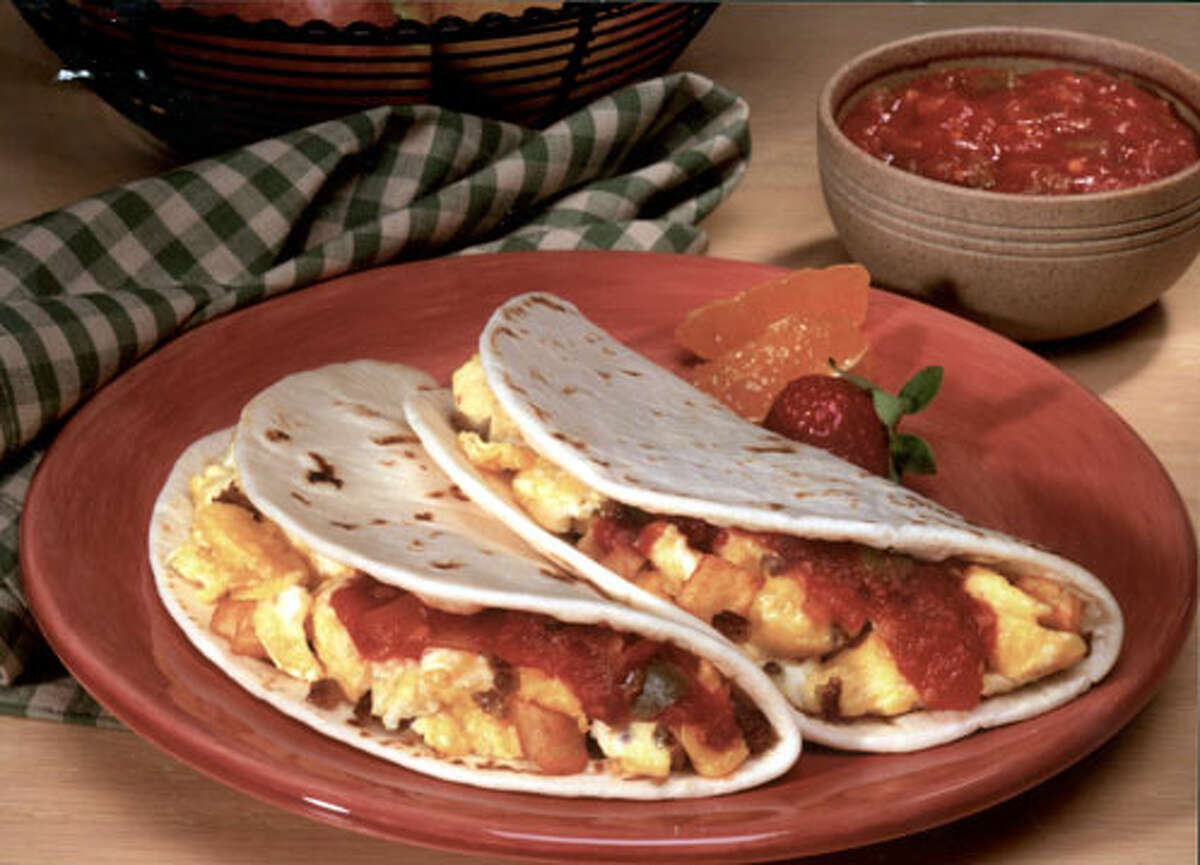 A bacon and egg taco has a moderate 230 calories, but 610 milligrams sodium. A potato and egg taco has 430 milligrams sodium.  