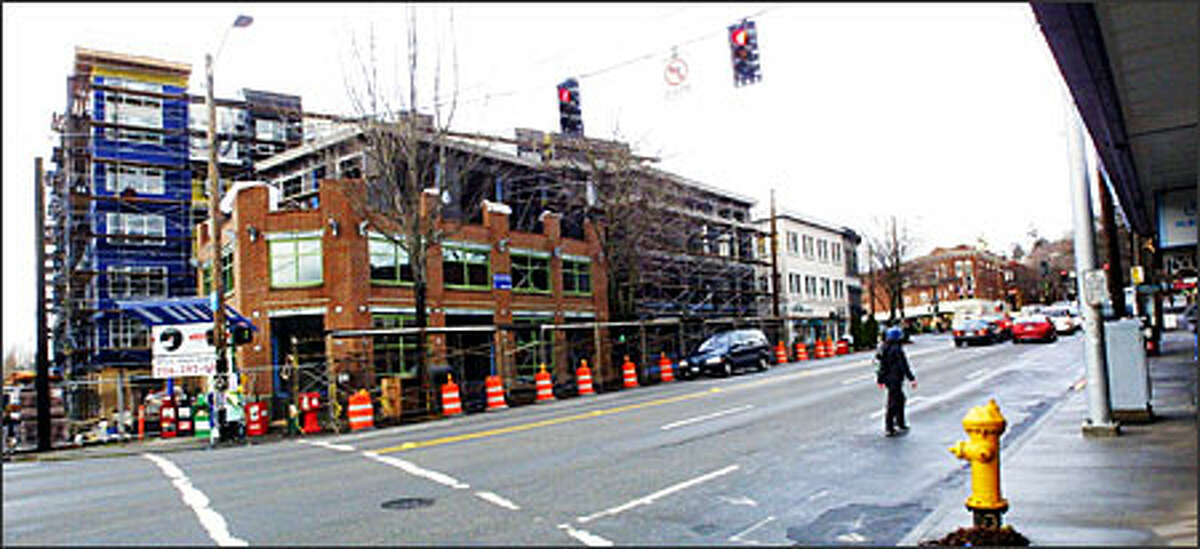 The building on the left, part of Fremont’s Block 40 project, is now leasing apartments and retail space. The building is at North 34th Street and Fremont Avenue North.