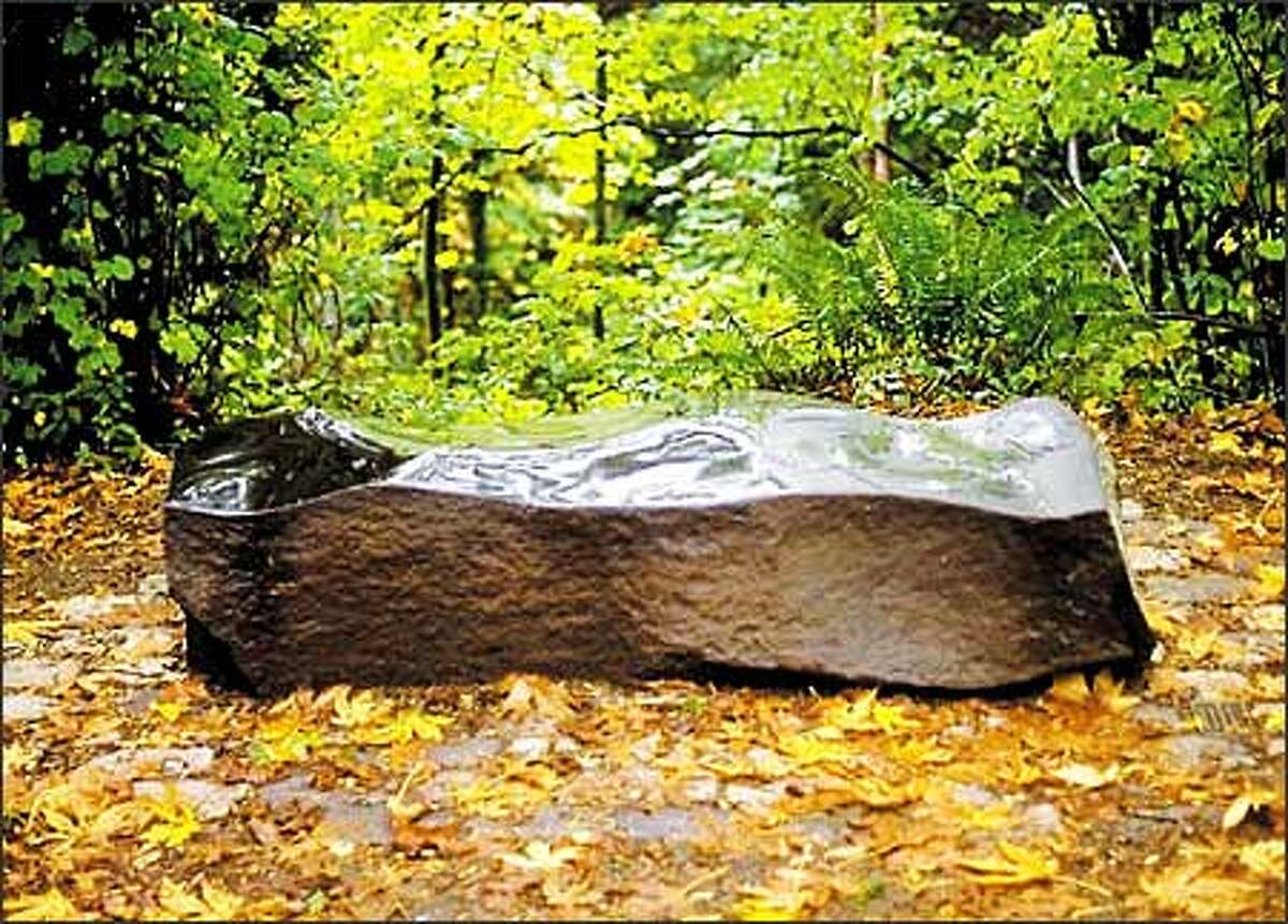 Bobbie Baker commissioned this basalt bench in Interlaken Park as a memorial to her husband, Rob Reed, who died in a plane crash in 1993. Reed, a producer for KCTS/9, was on assignment near Longview.