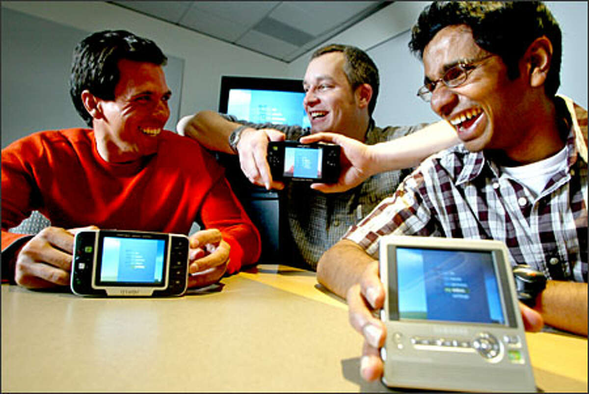 Microsoft's Portable Media Center was developed in the spare time of employees, from left, Marcus Ash, Brian King and Udiyan Padmanabhan.