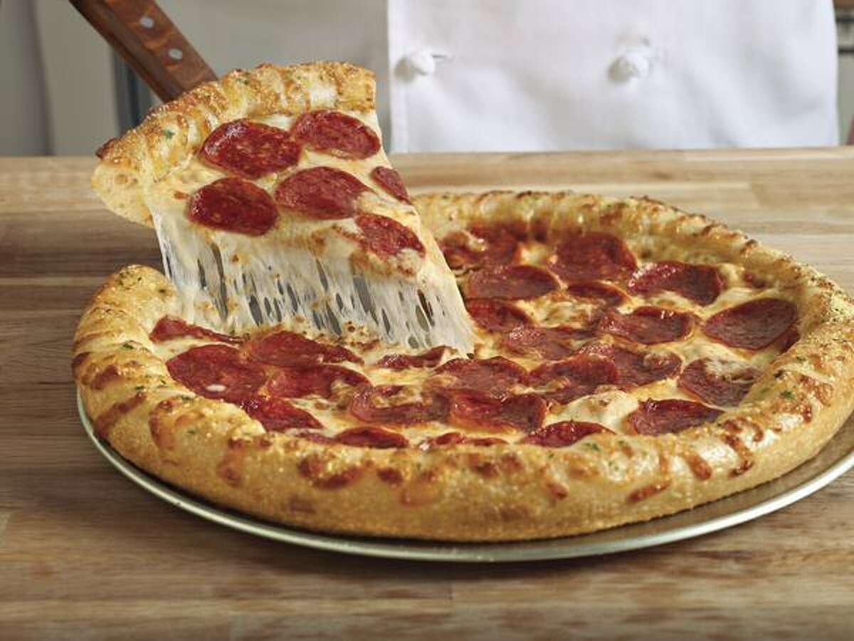 In this product image provided by Domino's, the company's new reformulated pizza is shown. As industry observers -- and even late-night TV hosts -- scratch their heads, the company's incoming CEO said the chain had no choice but to be honest about its pizza if it has any hope of winning back customers. (AP Photo/Domino's)