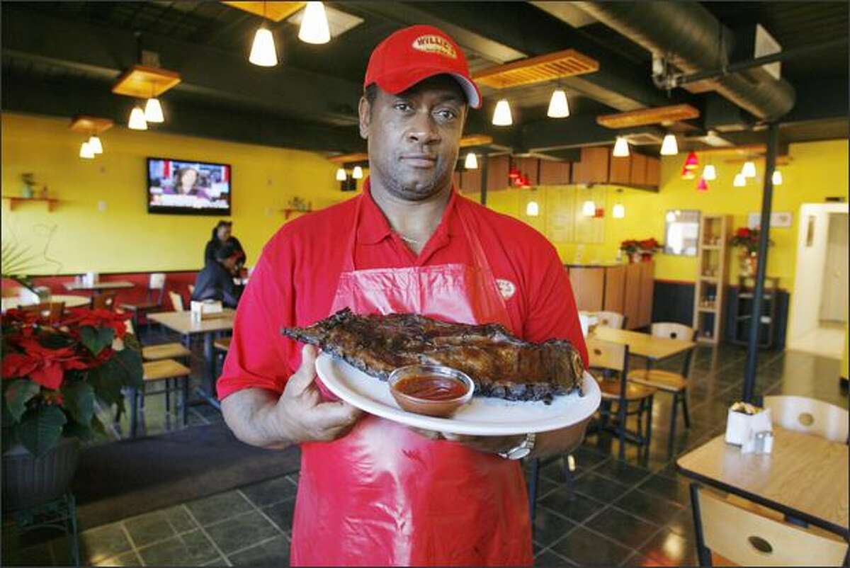Willie Turner, who grew up in Tallulah, La., slow-cooks brisket, ribs, chicken, hot links and pork shoulder over a wood fire at Willie's Taste of Soul Bar-B-Que. Side options include beans, potato salad, greens, yams and macaroni and cheese.