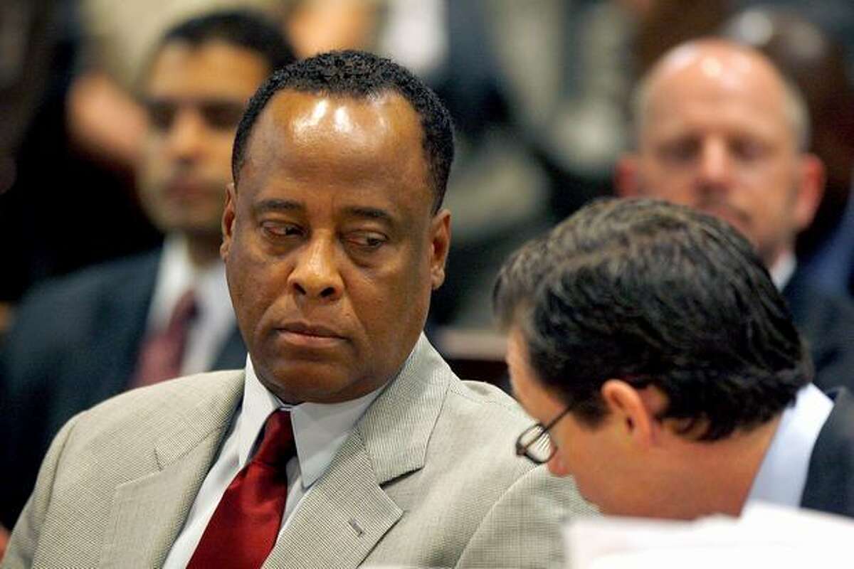 Dr. Conrad Murray (left) and defense attorney Ed Chernoff confer as Murray is arraigned in the County of Los Angeles Airport Branch Courthouse on a charge of involuntary manslaughter in connection with the death of pop star Michael Jackson on Monday, Feb. 8, 2010. Murray was personal physician to Michael Jackson when he died from an overdose of a powerful prescription sedative at the age of 50 on June 25, 2009. Jackson was rehearsing for a 50-concert comeback series at the O2 arena in London while staying at a rented estate in the Holmby Hills area of Los Angeles. He was pronounced dead at nearby Ronald Reagan UCLA Medical Center.