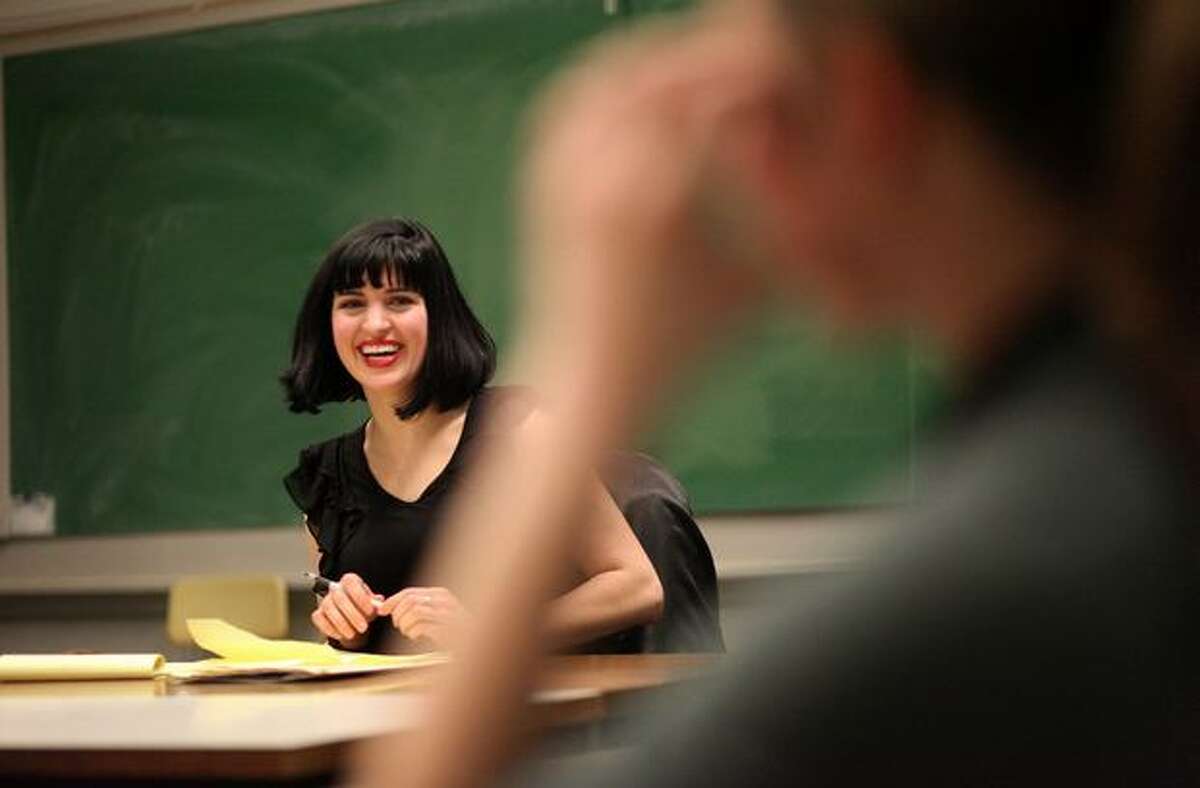Instructor Kate Stewart works with students during a session of Flirting 101, a course offered by the University of Washington Experimental College, on Thursday, Feb. 10, 2011. Stewart, a psychotherapist and dating expert, instructs the students on the "language of flirting."