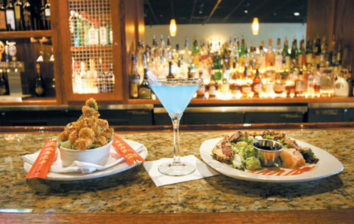 Bang Bang Shrimp and Ahi Sashimi (with a tarted-up Hypnotiq Martini) satisfy at Bonefish Grill.