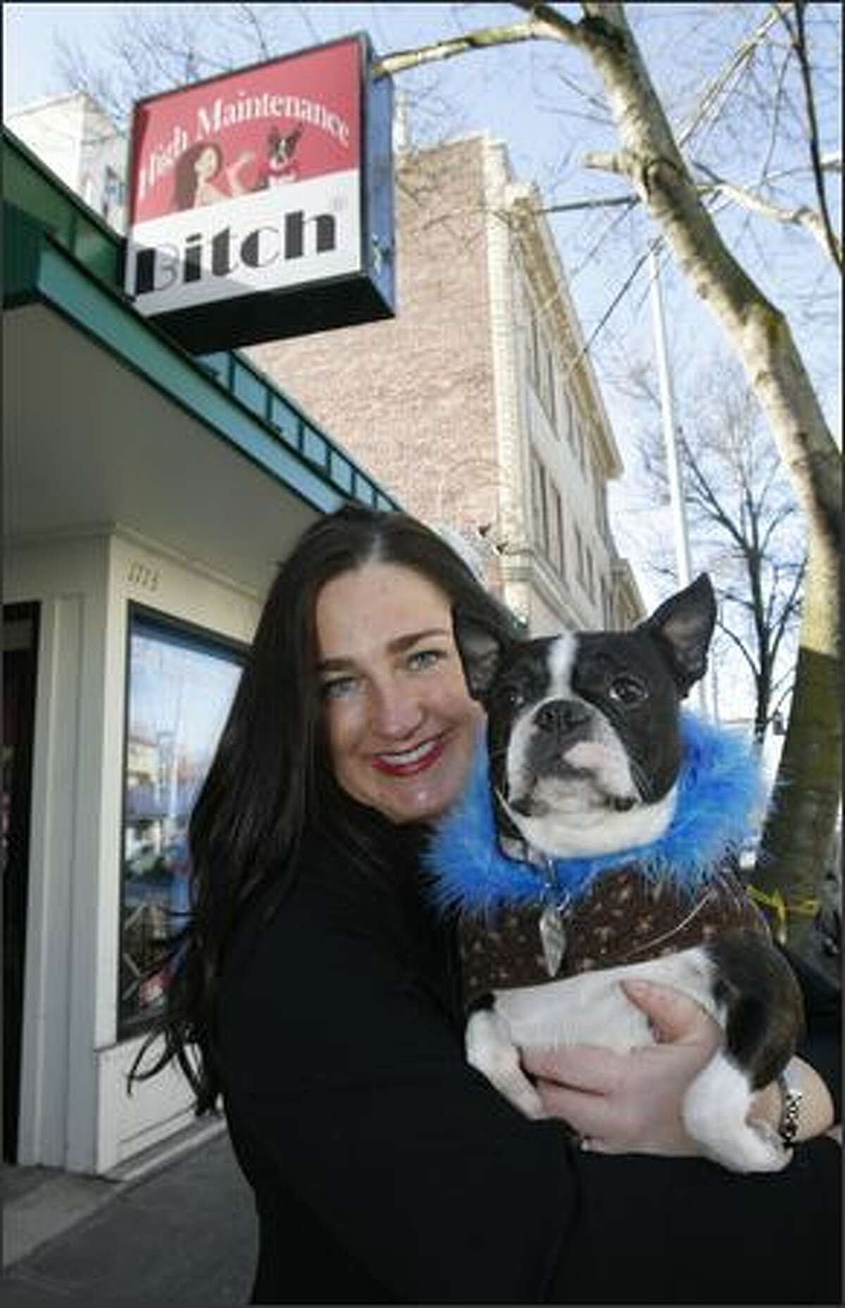 It all began five years ago, when Boston terrier Lola inspired Lori Pacchiano and her brother to make pet feather boas in their grandmother's North Seattle garage.