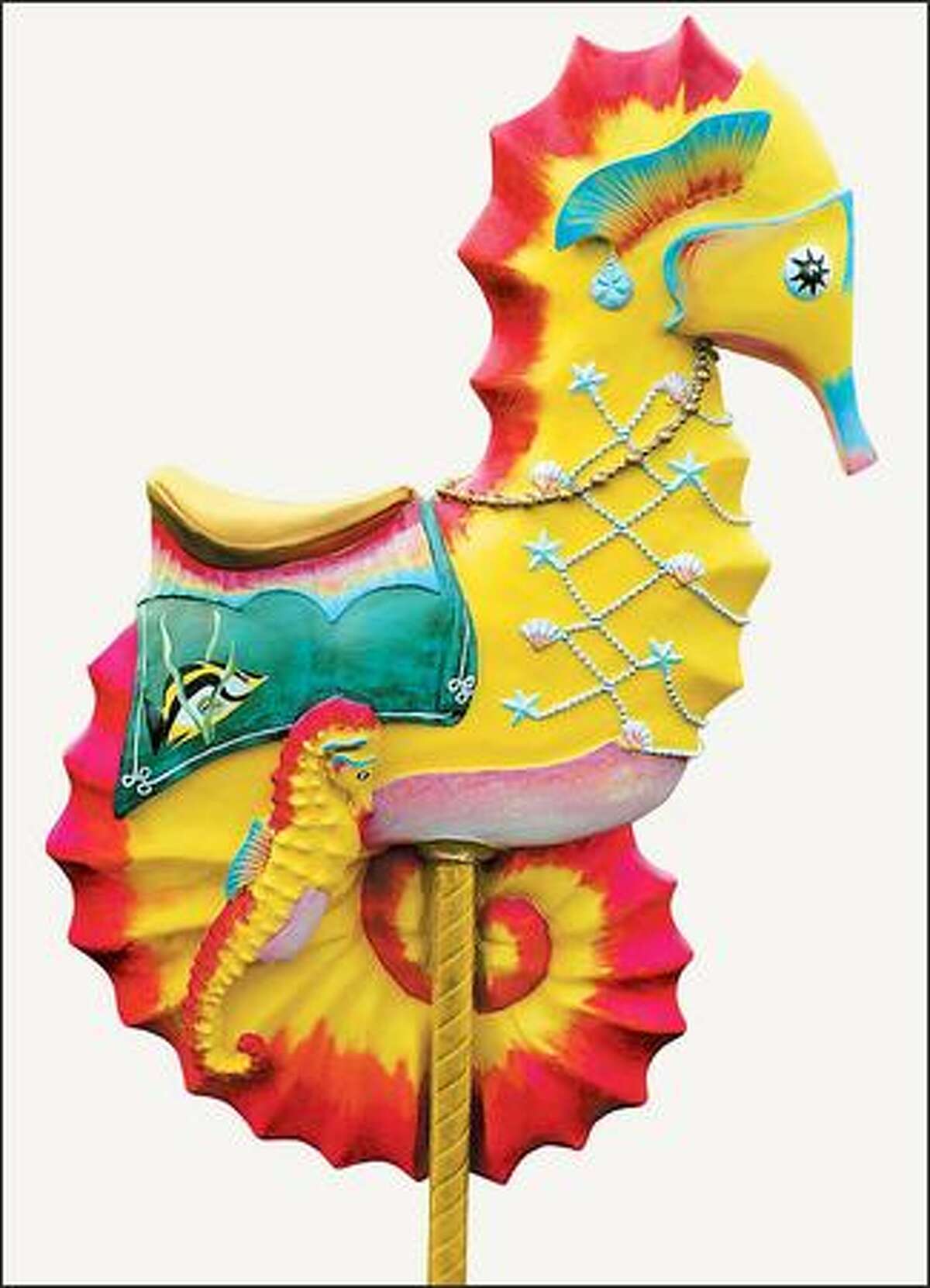 A brilliant seahorse is another of the 20 non-traditional carousel animals, such as butterflies, penguins and gorillas, the White brothers are sending to Indianapolis.