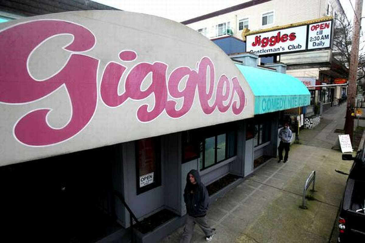 Jiggles strip club, previously known as Giggles Comedy Club, is shown on Roosevelt Way NE.