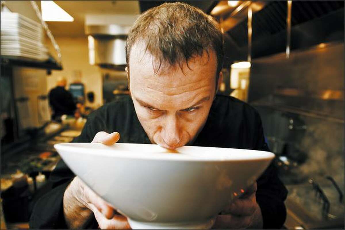 Boom Noodle executive chef Jonathan Hunt tastes some fresh broth in his Capitol Hill kitchen. He toured Japan to absorb the flavors and styles of the food.