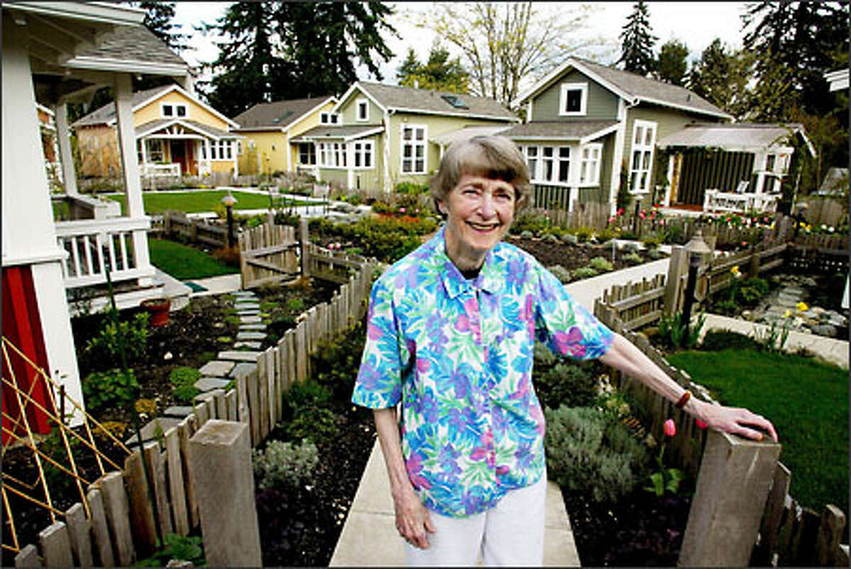 Rosellen Newhall, 78, lives in Greenwood Cottages in Shoreline with her daughter and her daughter’s three children. The houses are built around a common garden.