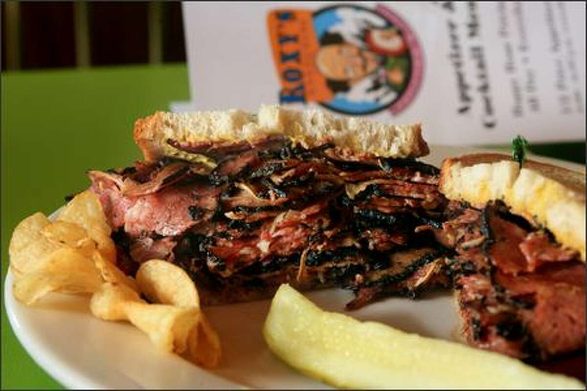 Roxy's hot pastrami sandwich comes in regular size ($8.25) or a super "NY" size ($13.20).