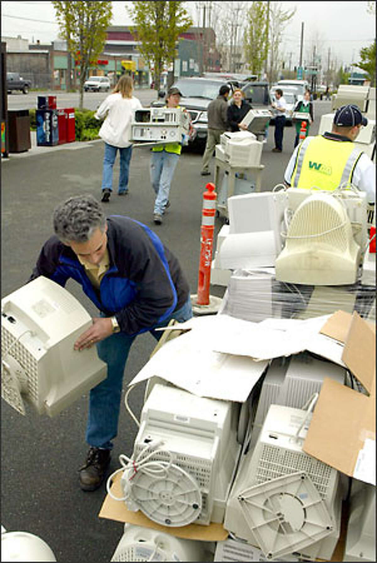 Workers collected computer equipment – four semi-trailers worth – during an Earth Day recycling event at Starbucks headquarters in Seattle. The monitors, central processing units and other computer equipment will be transported to Hewlett Packard’s recycling facility in Roseville, Calif. A similar event will take place this weekend in New York City.