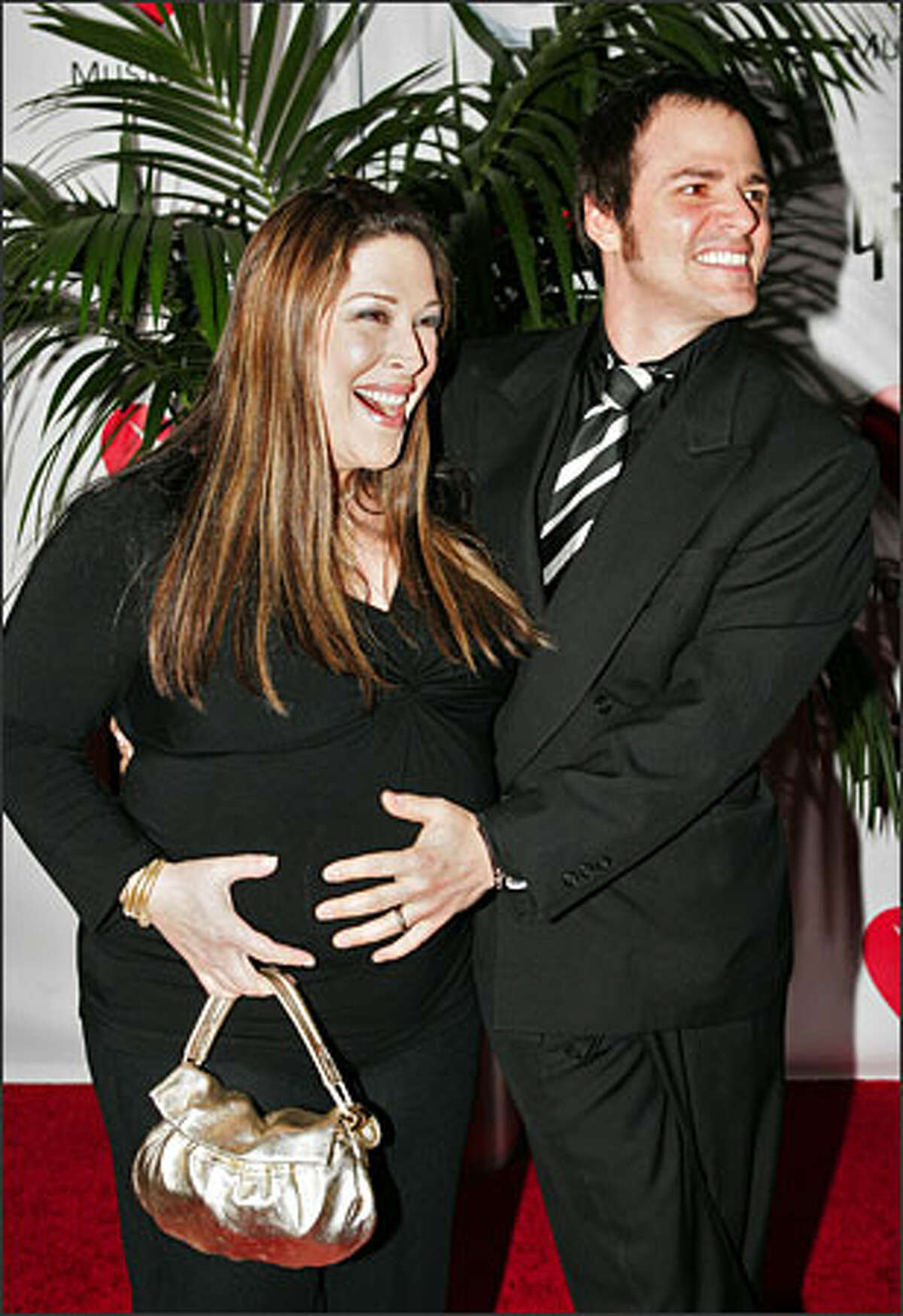 Carnie Wilson and her husband, Rob Bonfiglio, are parents of a baby girl, Lola Sophia. She is the first child for the couple, shown here at a tribute to Carnie's father, Brian Wilson, in February. The baby, born in Los Angeles, weighed 7 pounds, 2 ounces.