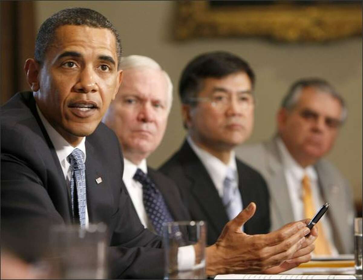 President Barack Obama meets with members of this cabinet including, from left, Secretary of Defense Robert Gates, Secretary of Veterans Affairs Eric Shinseki, and Secretary of Transportation Ray LaHood in the Cabinet Room of the White House in Washington, Friday, May 1, 2009. (AP Photo/Gerald Herbert)