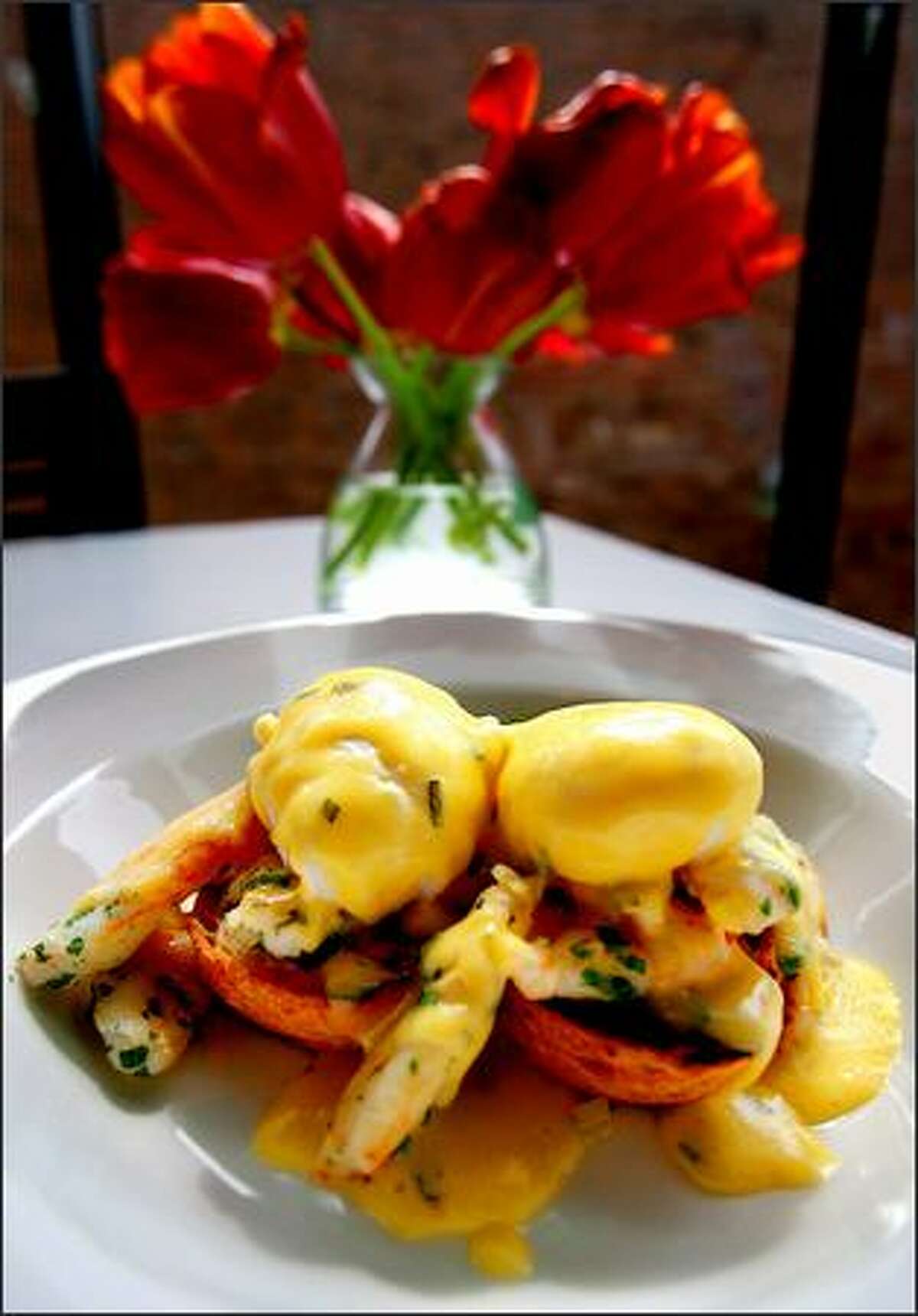 Squimbled Eggs, or Steelhead Diner-style eggs Benedict: poached eggs, crab, herbed toast and hollandaise sauce.